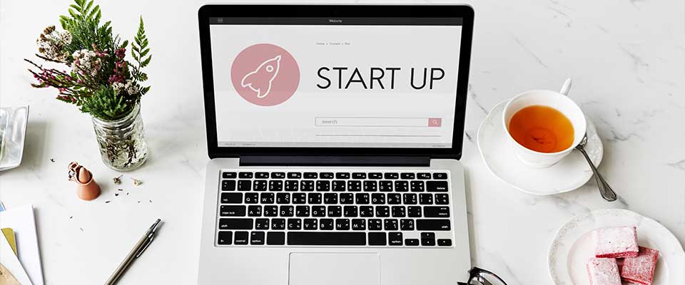 image of a startup website on a laptop screen