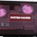 Image of a computer screen displaying: System Hacked